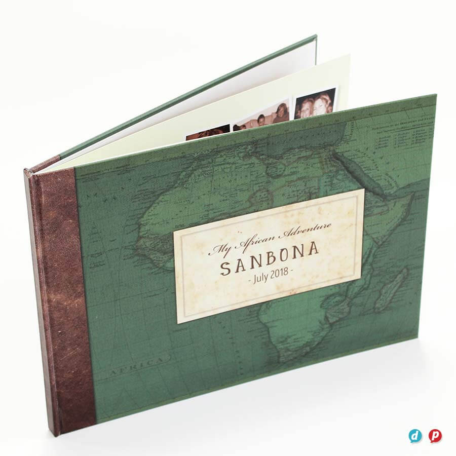 Custom travel scrapbook titled "My African Adventure SANBONA" with map design.