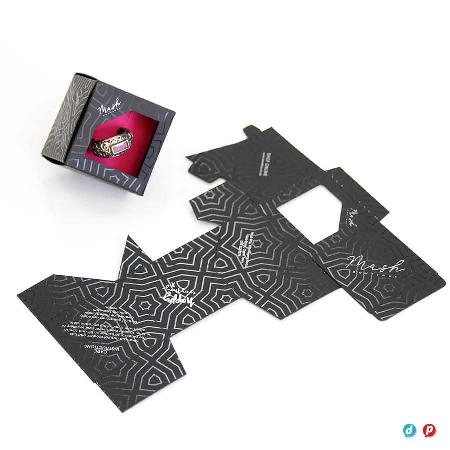 Black and white packaging design for Hot Ink, featuring geometric patterns and a pink ink bottle ins.