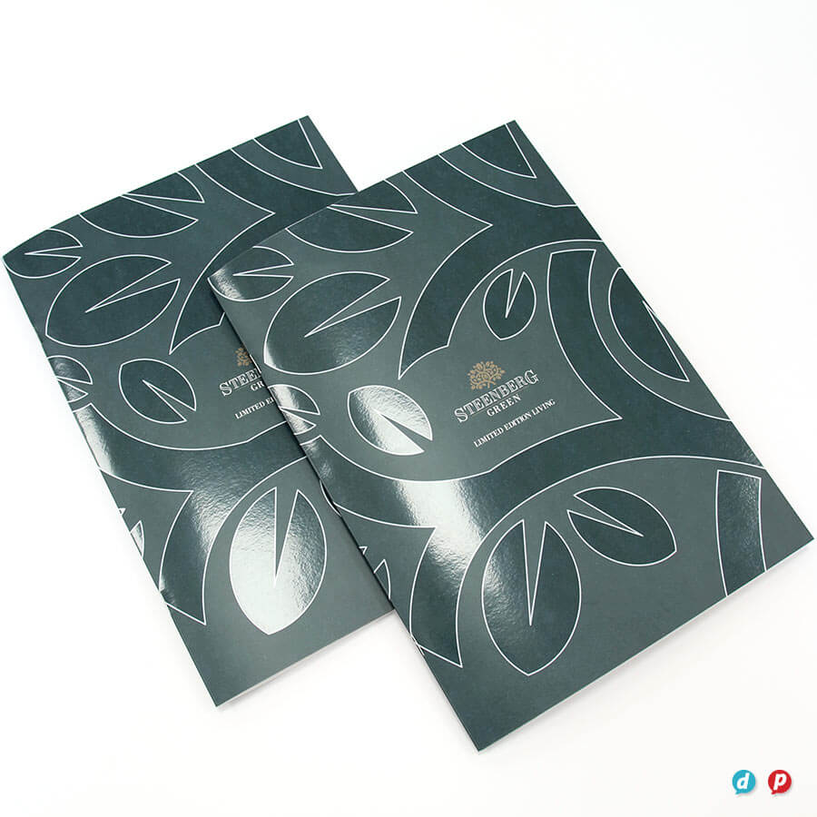 Modern dark green packaging with leaf patterns for Hot Ink branding.