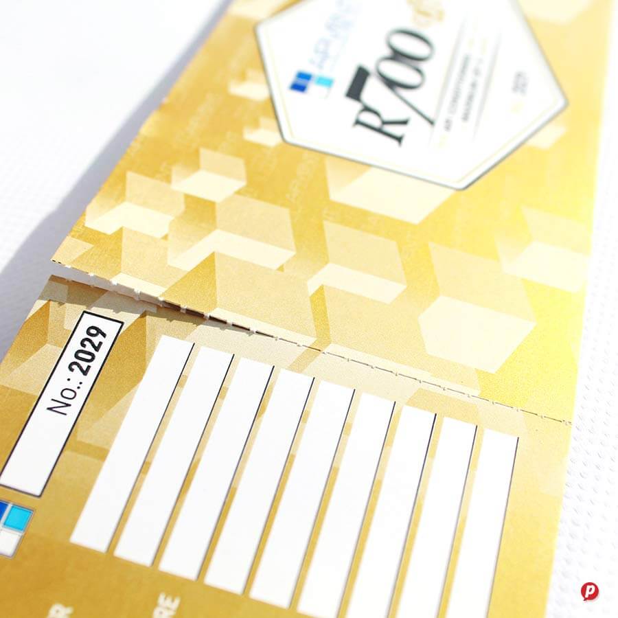 100 Rand banknotes with security features and holographic elements.