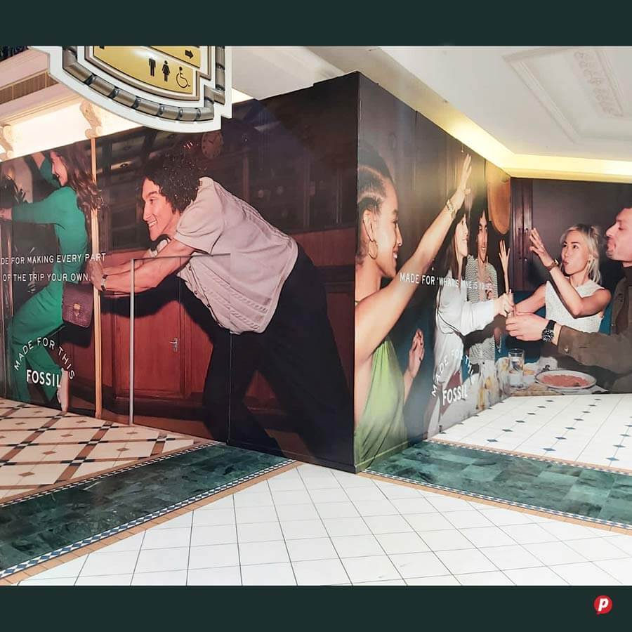 Group of people enjoying a lively celebration at a restaurant or event space.